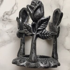 Steel metal rose base with clear glass wax melt holder .